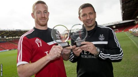 Adam Rooney and Derek McInnes (right) show off their awards