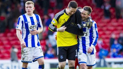 Kilmarnock's Barry Nicholson jokes with Aberdeen's Jamie Langfield