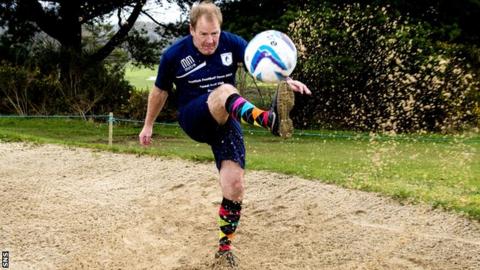 Former Celtic midfielder Murdo MacLeod kicks out a bunker