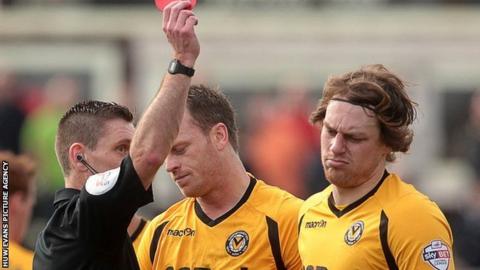Newport's Adam Chapman is sent off against Portsmouth