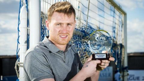 Rory McAllister with his award