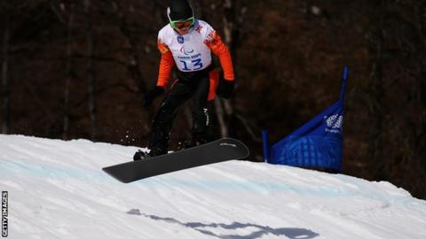 Chris Vos of the Netherlands competes during the Men's Para Snowboard Cross Standing