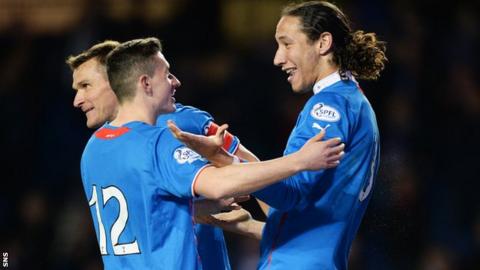 Rangers' Bilel Mohsni (right) celebrates with team-mate Fraser Aird