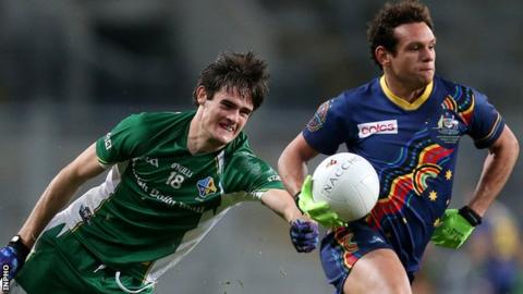 Ireland's Chrissy McKaigue in action against Steven Motlop of Australia at Croke Park in October 2013