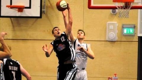 Derby's Alex Dorr battling for a rebound against Ipswich’s Leigh Greenan