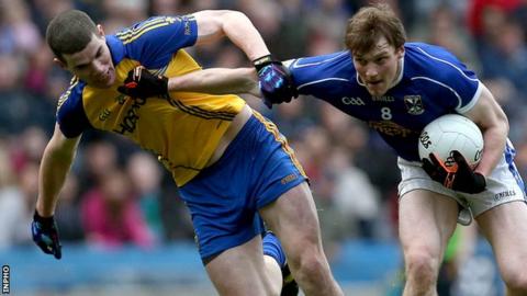 Cavan's Gearoid McKernan attempts to brush off Roscommon's Cathal Shine at Croke Park