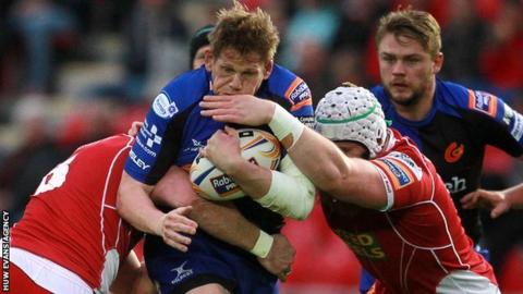 Jake Ball tackles Rhys Thomas