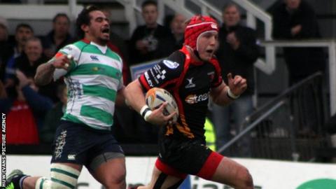 Dragons' Tyle Morgan runs in for a try