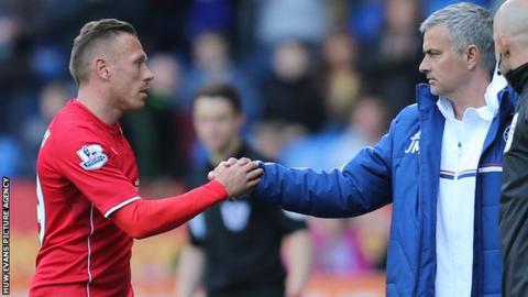 Craig Bellamy shakes Jose Mourinho's hand following Chelsea's 2-1 win at Cardiff