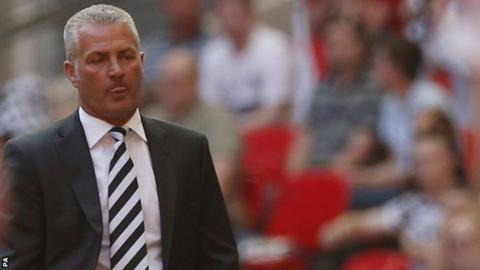 Gateshead manager Gary Mills looks on after defeat by Cambridge United at Wembley