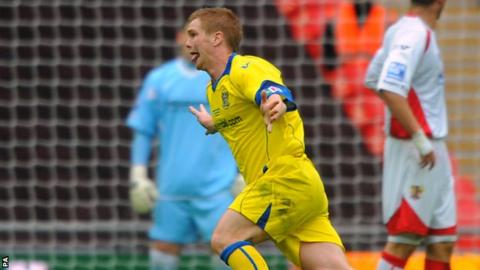 Barrow's Jason Walker celebrates scoring his sides second goal of the game in the FA Trophy final with Stevenage