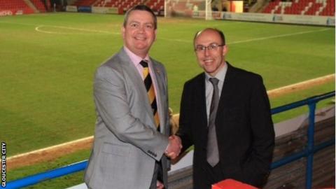 Gloucester City's Stuart Pike (left) with Cheltenham chairman Paul Baker
