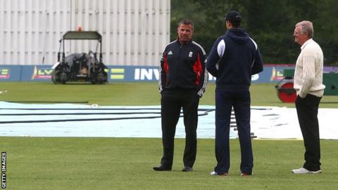 The umpires chat to groundstaff at Merchant Taylor's School