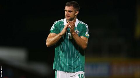 Aaron Hughes hopes to resolve his future after international duty