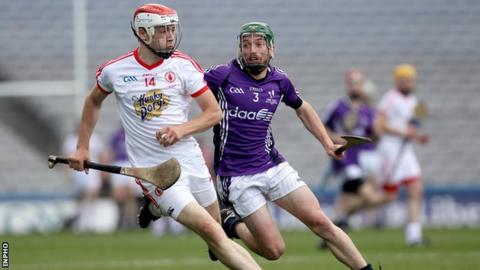 Tyrone's Conor Grogan celebrates winning the Nicky Rackard Cup