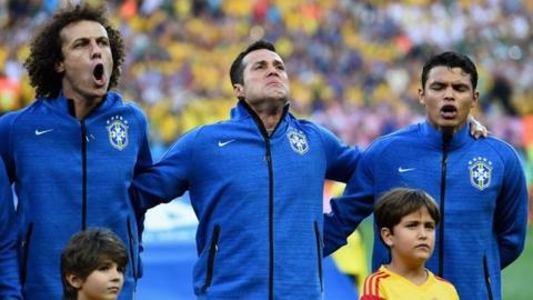 David Luiz, Julio Cesar and Thiago Silva sing the Brazilian national anthem