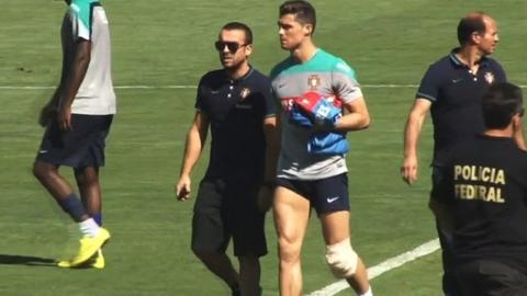 Cristiano Ronaldo limps out of training