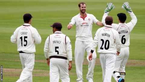 Lancashire all-rounder Tom Smith celebrates another wicket