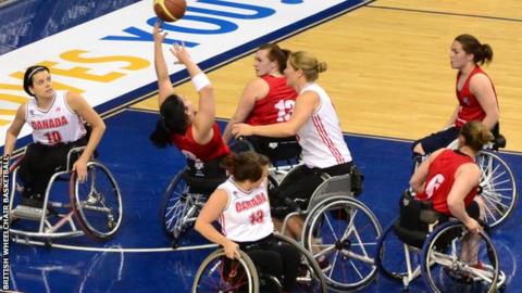Great Britain take a shot in their final poll game against Canada.