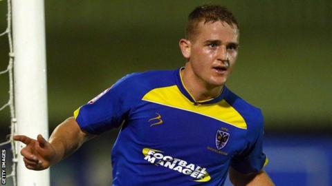 Charlie Strutton in action for AFC Wimbledon