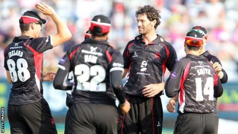Charlie Shreck celebrates with his Leicestershire team-mates