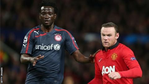 Delvin N'Dinga (left) battles against Manchester United's Wayne Rooney