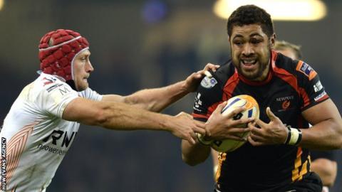 Ospreys' Richard Fussell tries to tackle Newport Gwent Dragon Taulupe Faletau