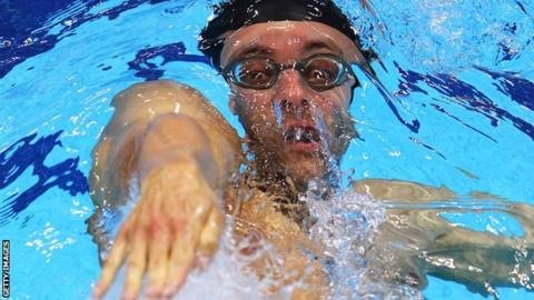 Marco Loughran during a backstroke race