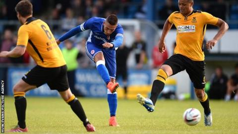 Federicho Macheda fires in a shot against Carmarthen Town