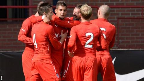Dundee players celebrating