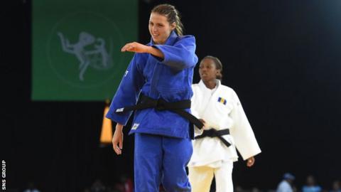 Scotland's Kimberley Renicks celebrates after making it to the -48kg final