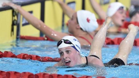 Miley earns gold after stunning swim