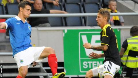 Linfield's Matthew Clarke in action against AIK Solna in the Europa League