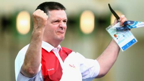 Michael Gault celebrates equalling the record for Commonwealth Games medals