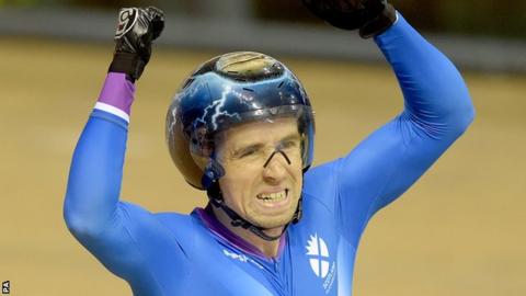 Neil Fachie celebrates his gold medal in the Para-Sport Sprint B Tandem