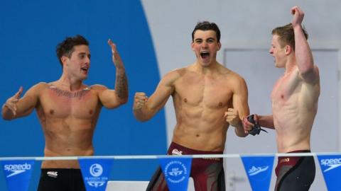 England's relay team celebrate winning gold