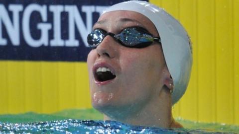 Wales' Georgia Davies takes gold in the 50m backstroke