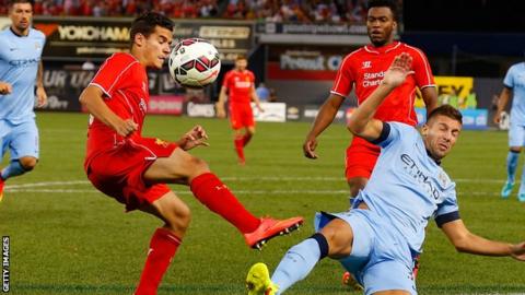 Matija Nastasic of Manchester City (right) and Philippe Coutinho of Liverpool vie for the ball during the International Champions Cup tie at Yankee Stadium
