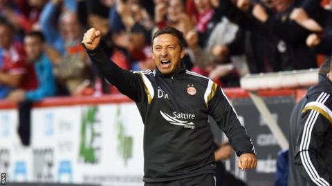 Derek McInnes celebrates after Mark Reynolds put Aberdeen in front against Real Sociedad