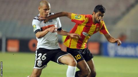 Esperance's Oussama Darragi challenges Setif's Mohamed Lagraa