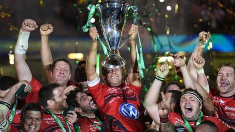 Toulon's Jonny Wilkinson lifts the trophy after winning the Heineken Cup