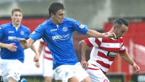 Hamilton's Dougie Imrie breaks clear from Adam Morgan