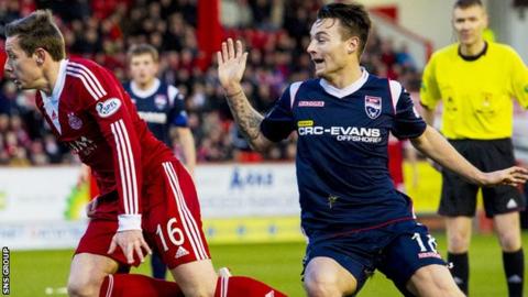 Marc Klok (right) has left Ross County