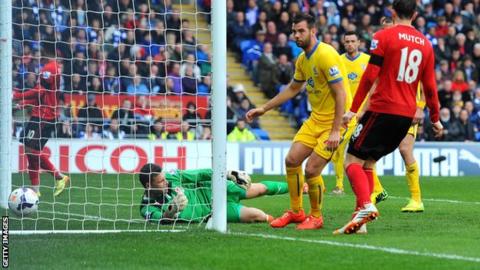 Crystal Palace's Joe Ledley scores against Cardiff City