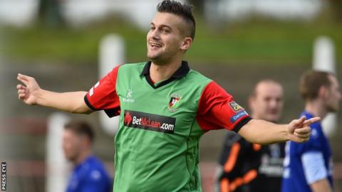 Mark Miskimmin celebrates scoring for Glentoran