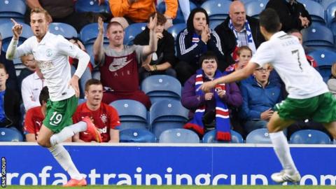 Danny Handling (left) scored and was sent off in this season's 2-1 Petrofac Training Cup loss to Rangers