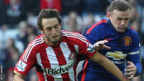 Will Buckley and Wayne Rooney
