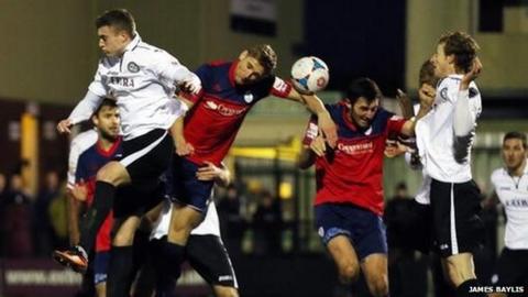 Mike Phenix heads Telford's late equaliser against Hednesford on Boxing Day