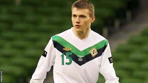Stuart Dallas playing against Wales in 2011
