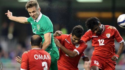 Kevin Doyle heads in to put the Republic ahead against Oman
